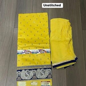 Yellow Unstitched Fabric with Silver Embroidery
